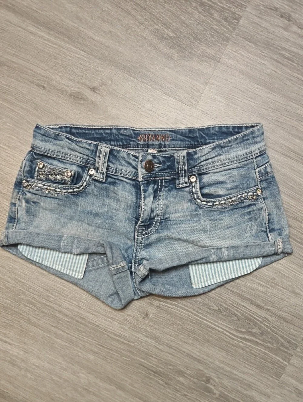Light Wash Denim Short Shorts with Embellished Pockets